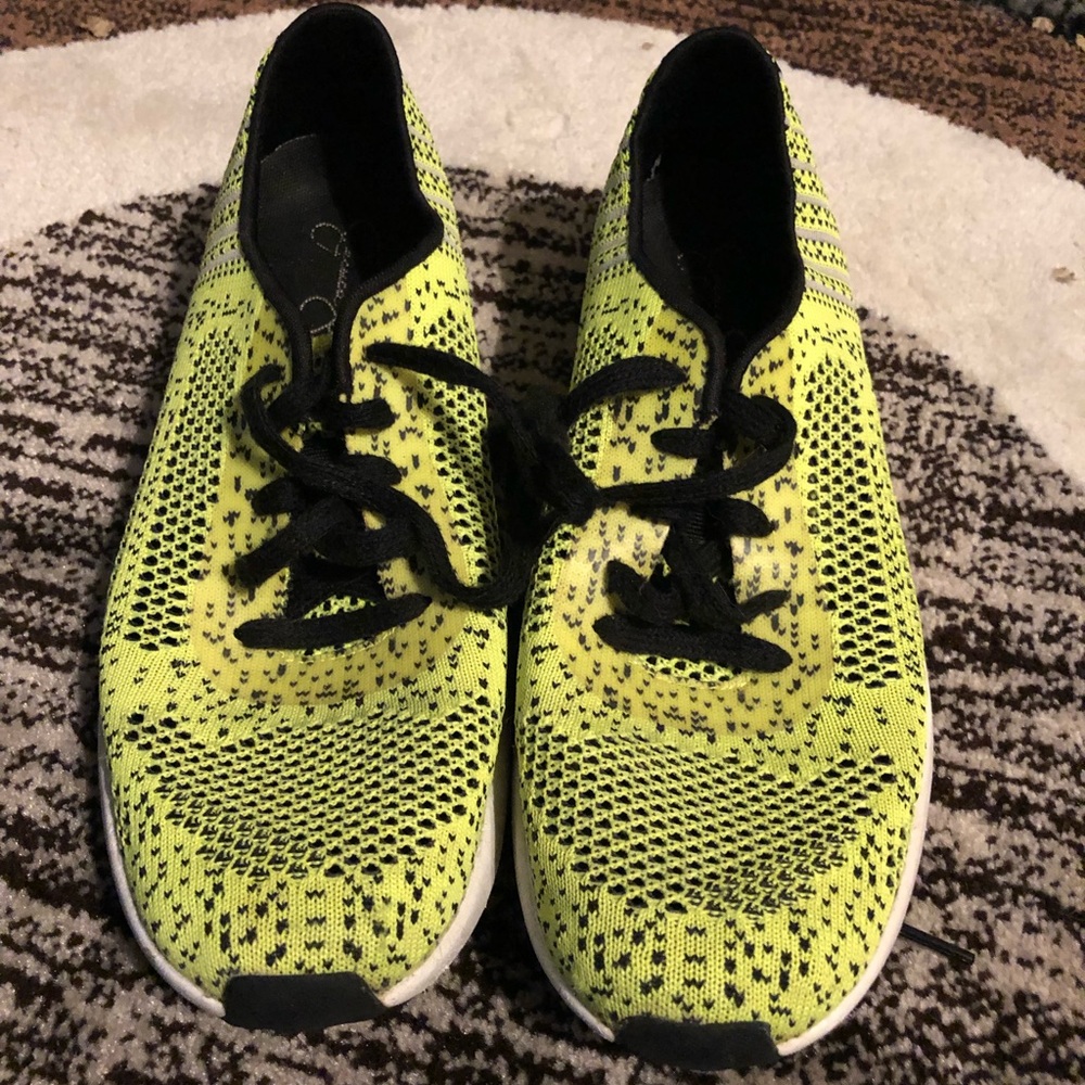 Neon yellow tennis shoes